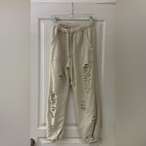 POL fashion sweatpants, Heather grey, pockets in front and bank.